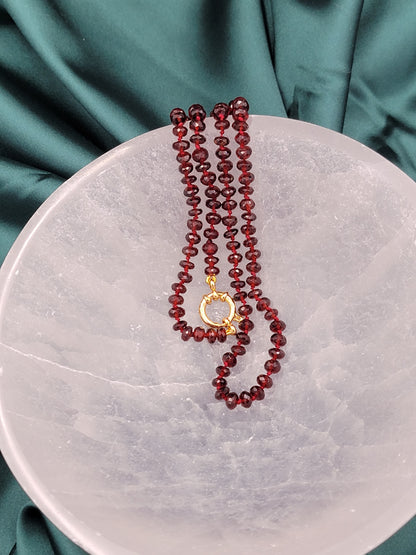 Hand-knotted silk Mozambique Garnet necklace with 24k gold filled clasp.