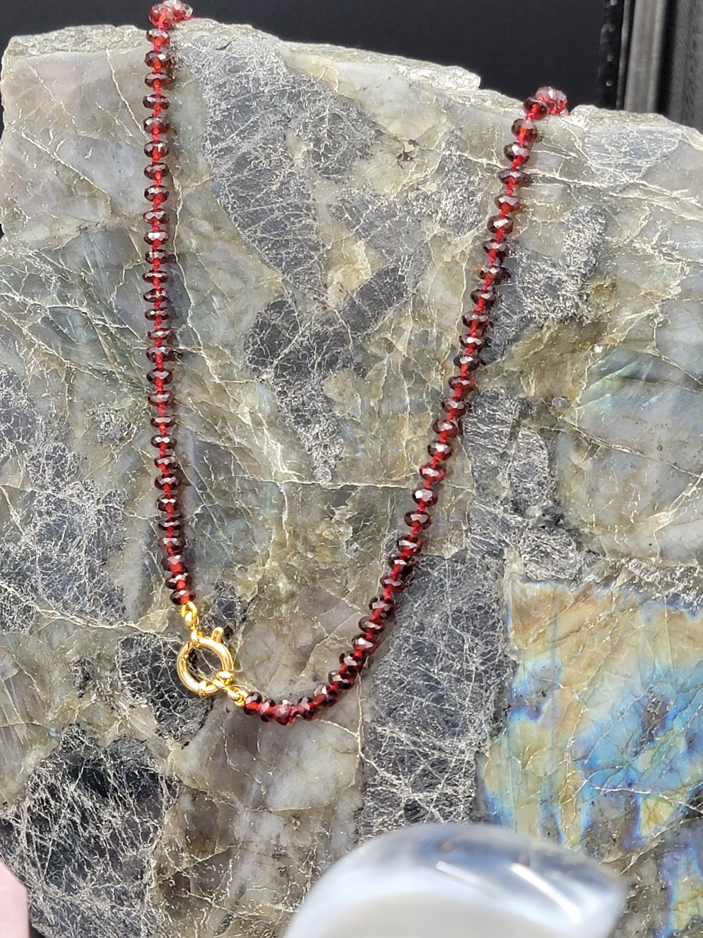 Hand-knotted silk Mozambique Garnet necklace with 24k gold filled clasp.