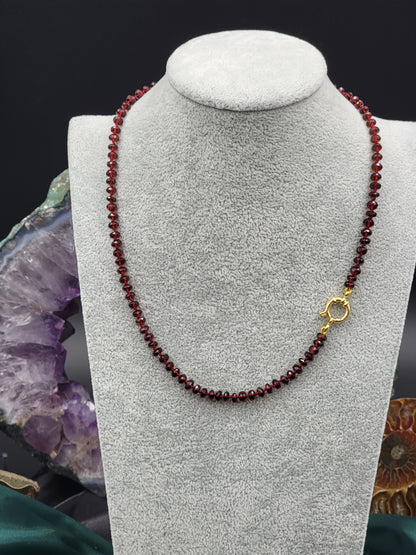 Hand-knotted silk Mozambique Garnet necklace with 24k gold filled clasp.