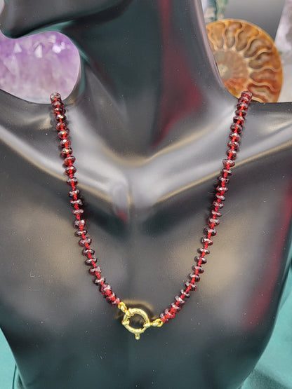 Hand-knotted silk Mozambique Garnet necklace with 24k gold filled clasp.