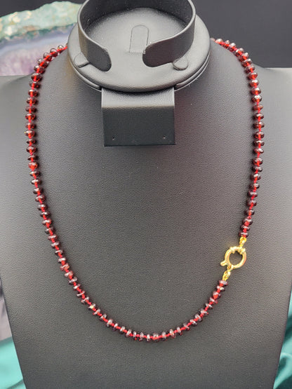 Hand-knotted silk Mozambique Garnet necklace with 24k gold filled clasp.