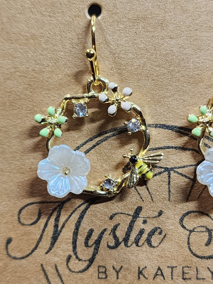 Gold plated floral charm style earrings with bees