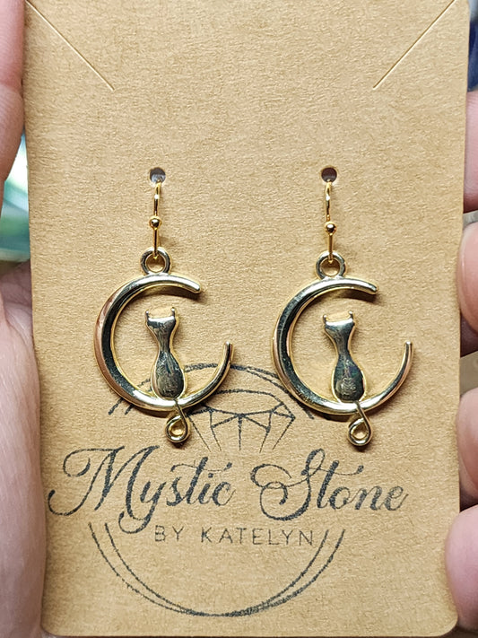 Gold plated cat sitting on a Crescent Moon 🌙  charm style earrings