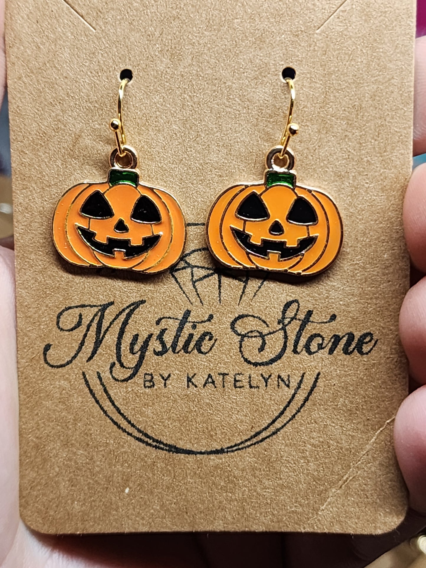 Gold plated enamel jack-o-lantern charm style earrings