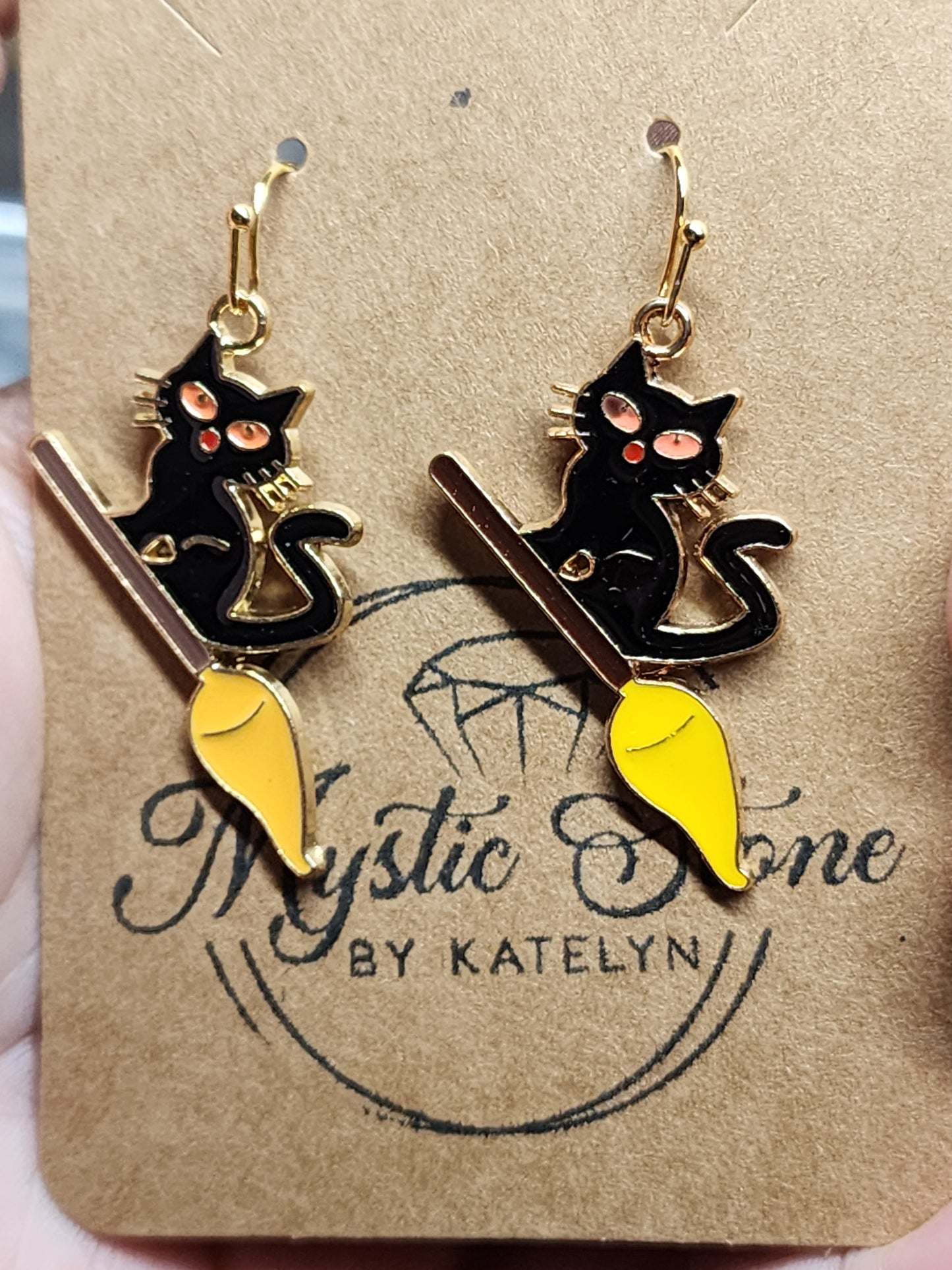 Gold plated Black Cat riding a broom charm style earrings. Gold plated, hypoallergenic & nickel free.  Halloween earrings