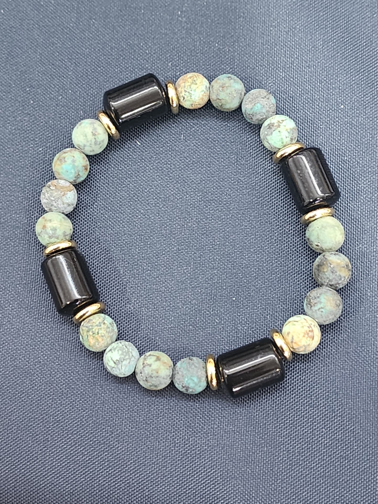 Matte African Turquoise and Black Onyx Gemstone Bracelet with Gold Plated Stainless steel accents